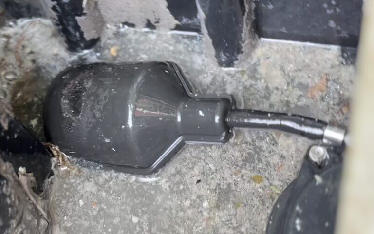 Float switch in a graywater surge tank